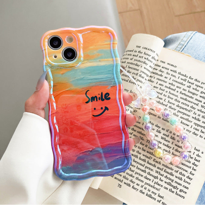 Accessories are suitable for Apple 14promax rainbow smiley face mobile phone case, the new 12/13pro/14 high-end creative all-inclusive.