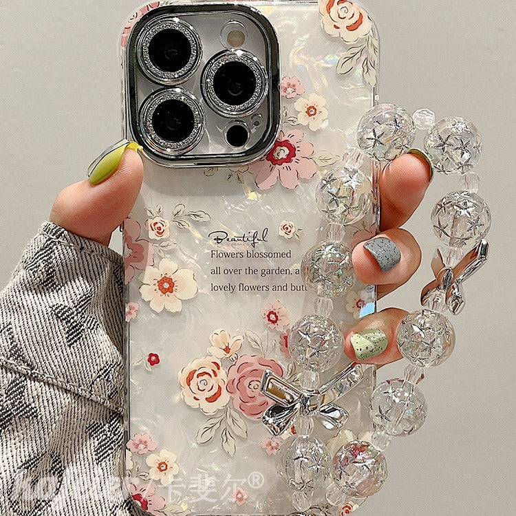 Accessories for summer super fairy shell pattern English flower bracelet iphone15pro max mobile phone case apple 14 new