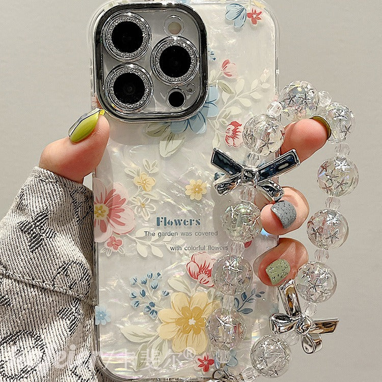 Accessories for summer super fairy shell pattern English flower bracelet iphone15pro max mobile phone case apple 14 new