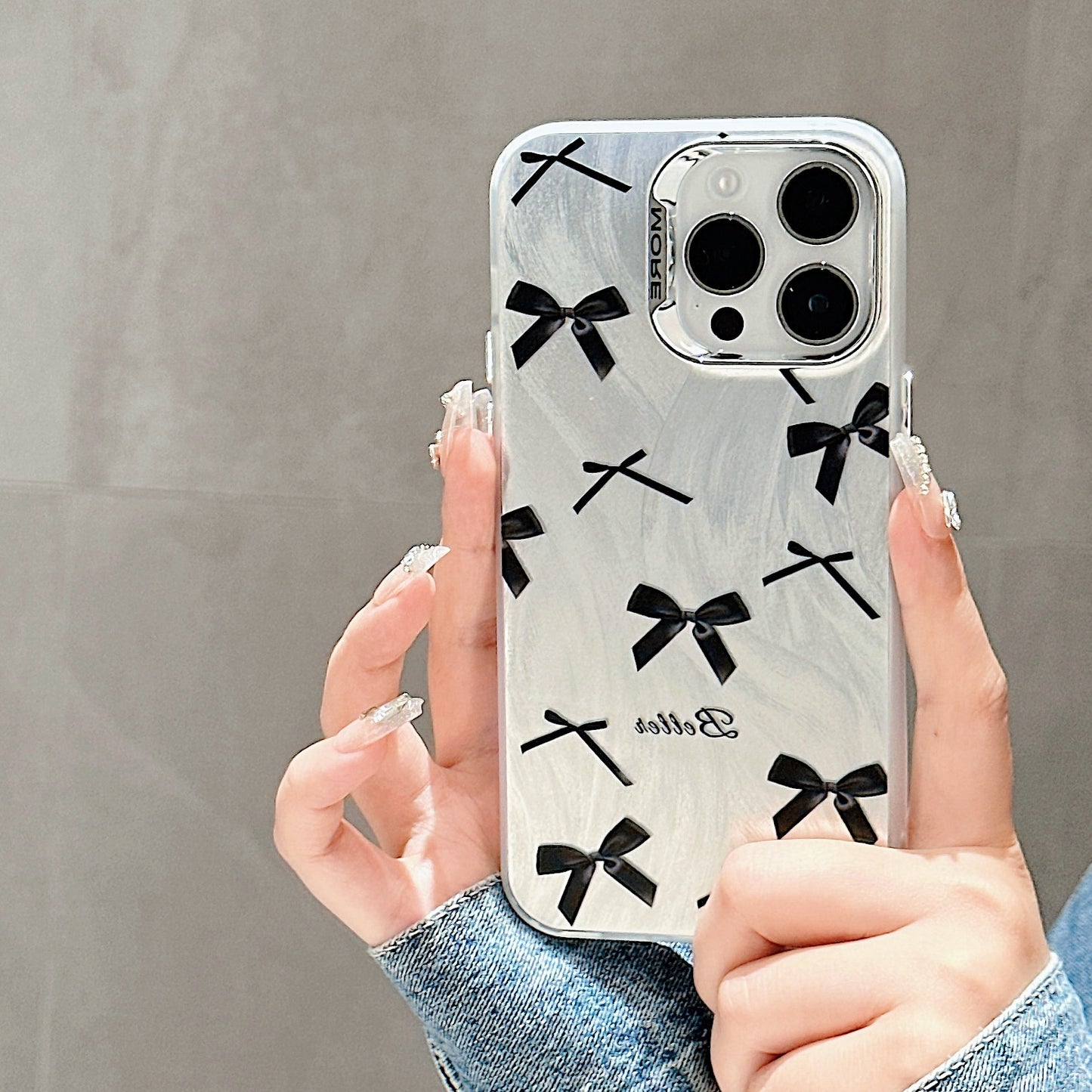 Accessories Simple bow is suitable for Apple 15Pro mobile phone case iphone14 new texture 13 niche 12 cute